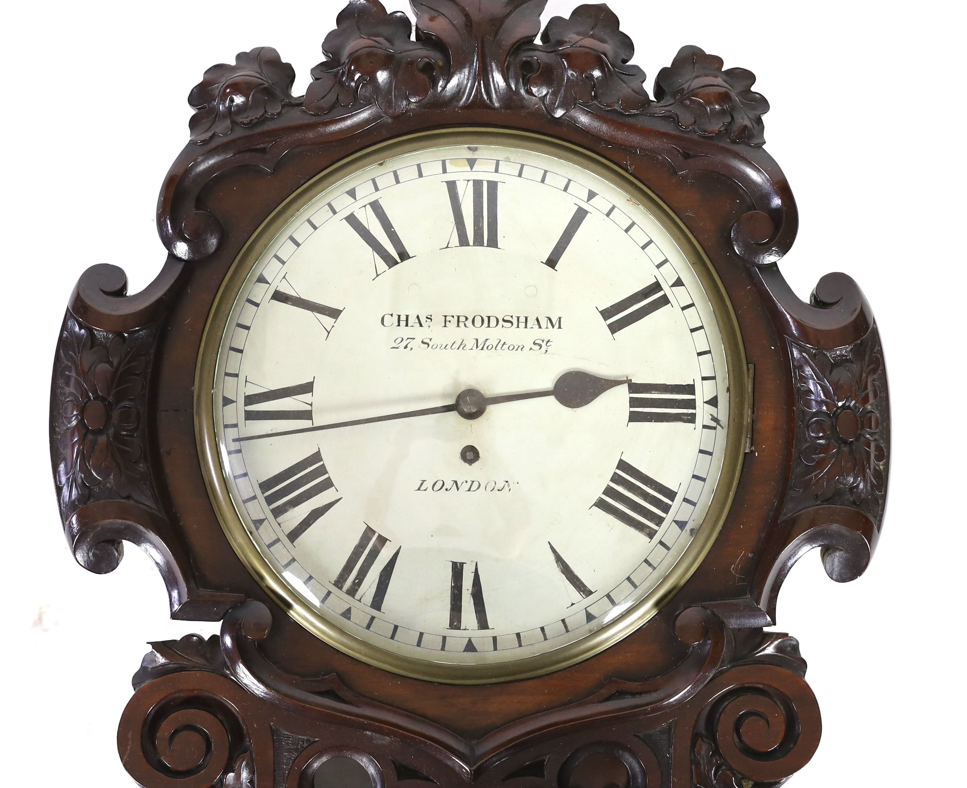 Charles Frodsham, 27 South Molton Street, London. A Victorian carved mahogany drop dial wall timepiece, width 48cm, height 76cm